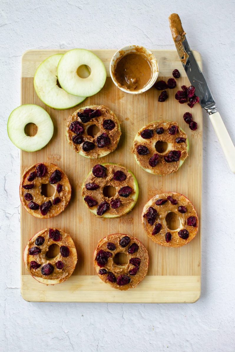 Apple ‘Donuts’ with Nut Butter Icing & Craisins